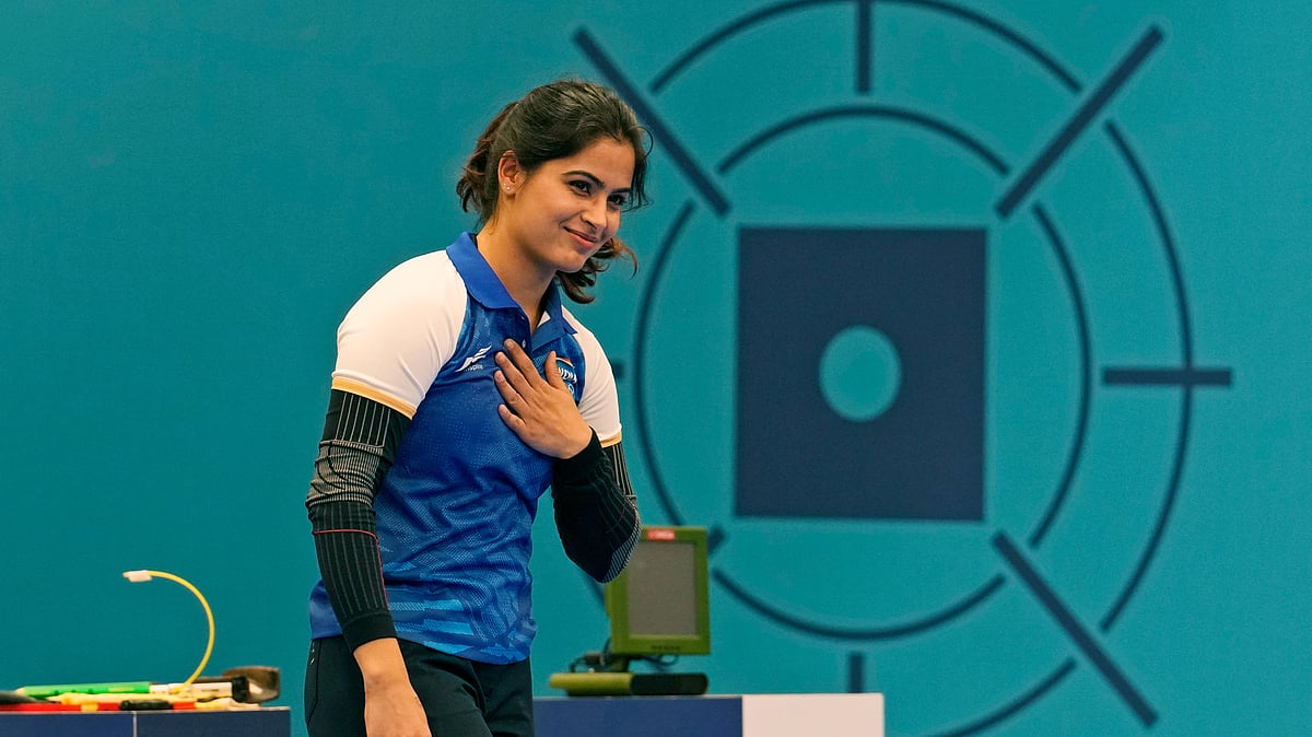 (AP Photo/Manish Swarup)
 : India's Manu Bhaker celebrates after winning the bronze medal in the 10m air pistol women's final round at the 2024 Summer Olympics, Sunday, July 28, 2024, in Chateauroux, France.

